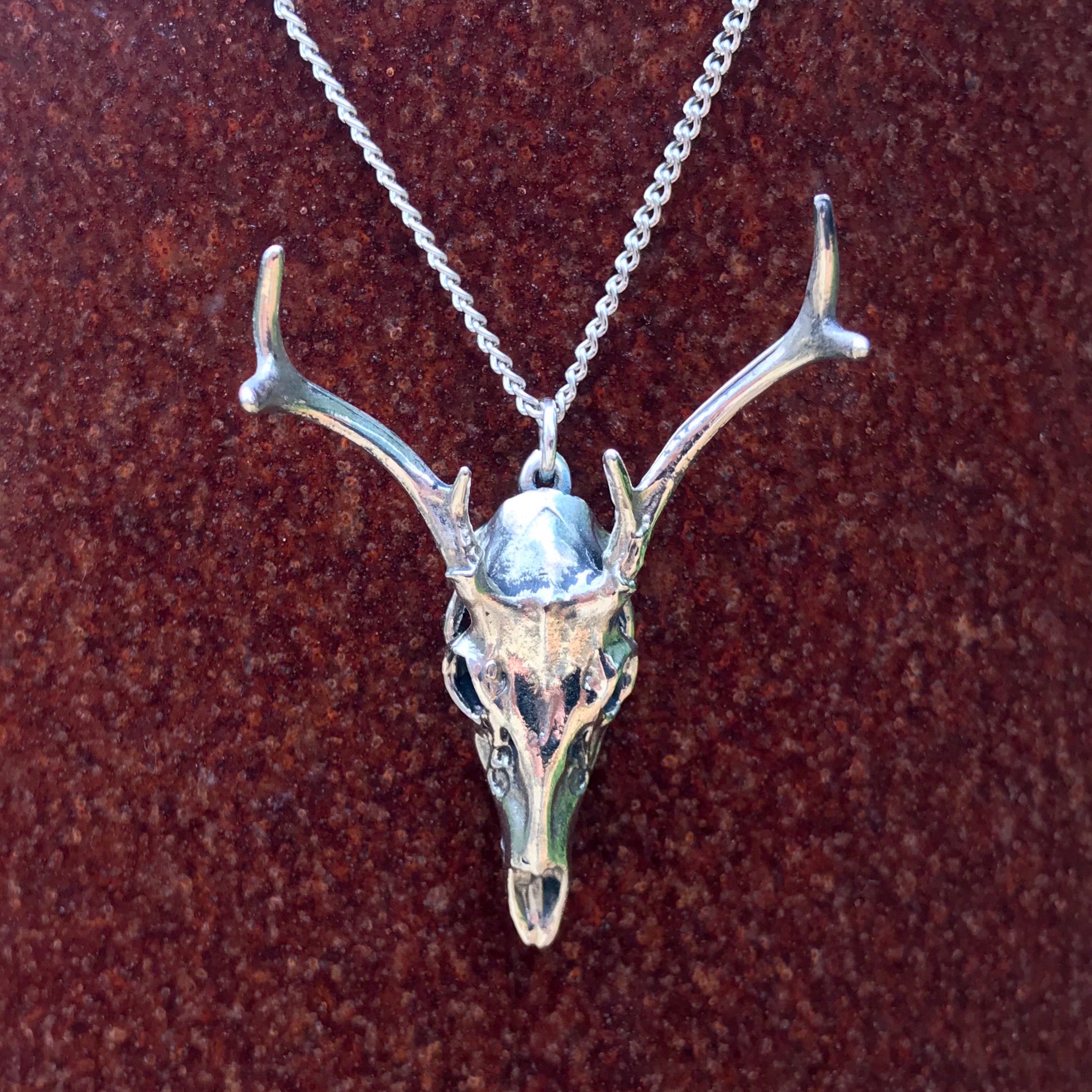 Pinecone authentic deer skull necklace, rear mirro